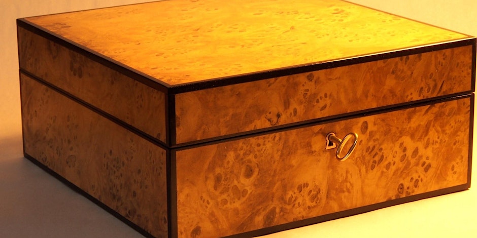 fancy wooden box with golden hugh