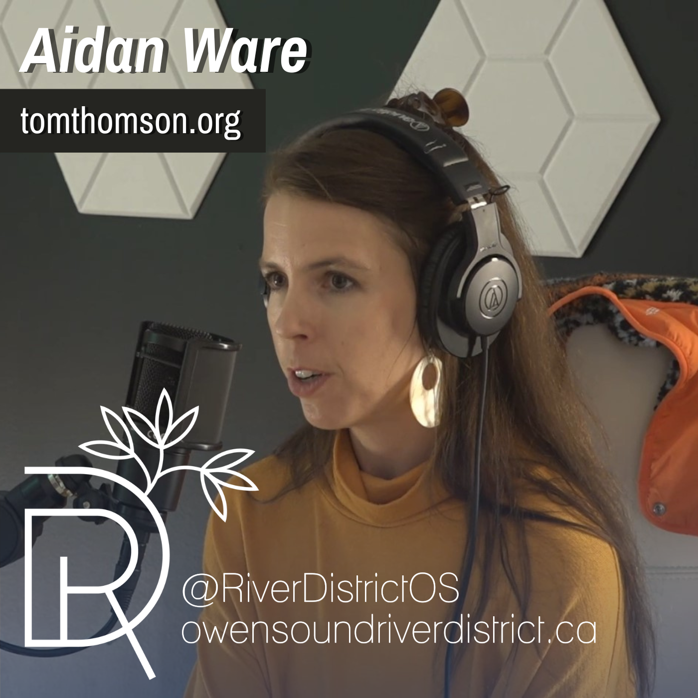 aidan ware in podcast studio at microphone