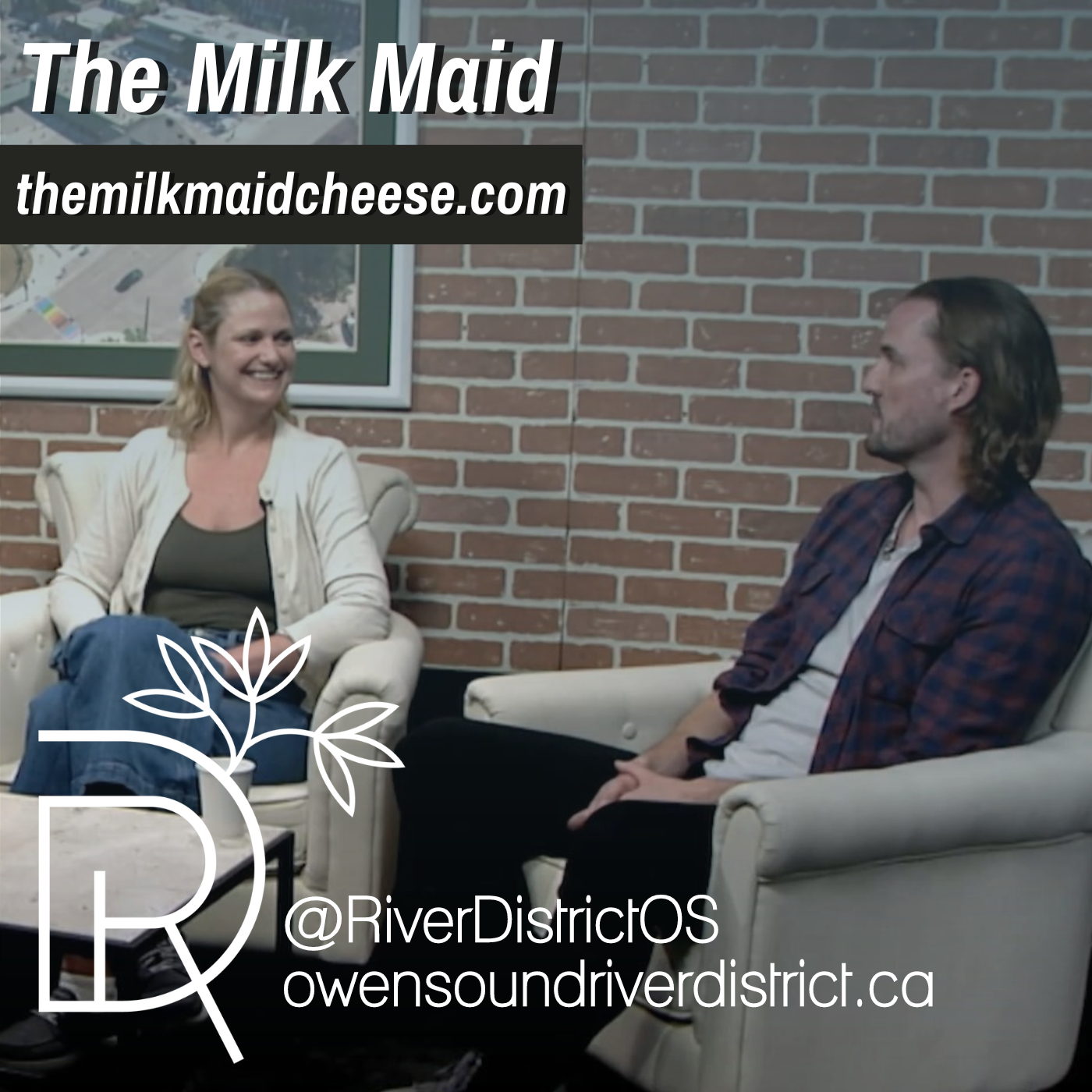 Robin and Sarah Miller sitting against a faux brick wall in white chairs