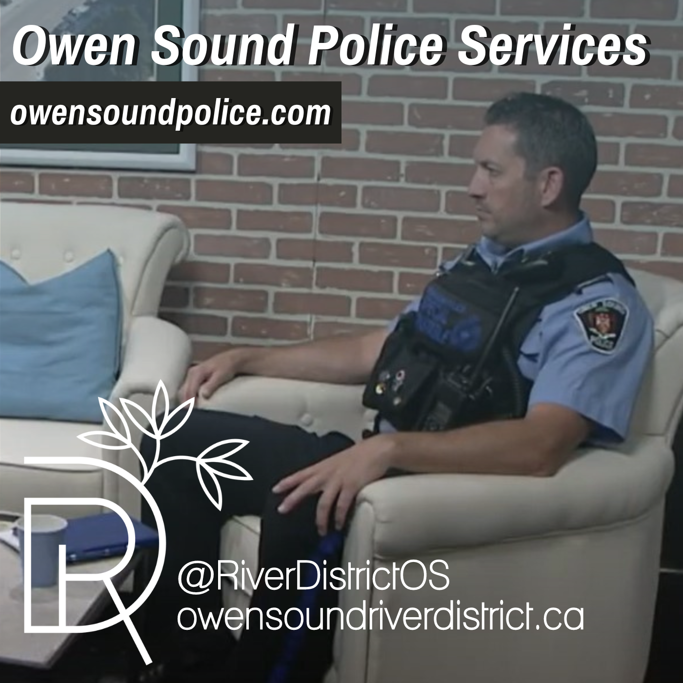 jason cranny in police uniform against faux brick wall