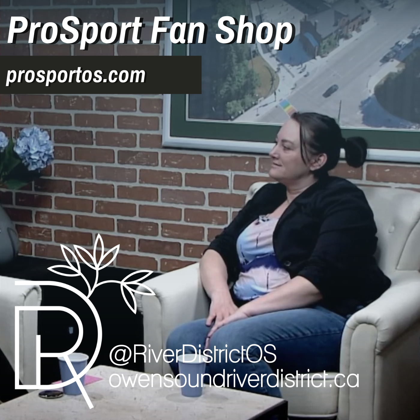 sharon walter sitting in a white char against a faux brick wall