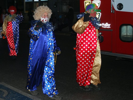clowns walking down the street