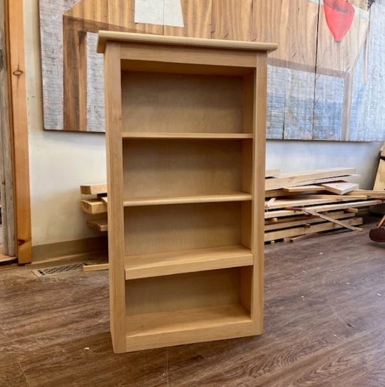 Event image of woodworking bookcase with hand-tools